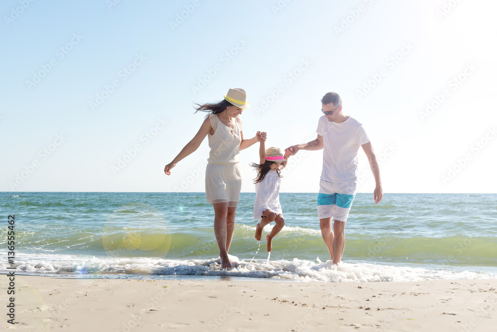 Family on tropical beach