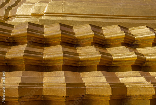 Closeup of golden stupa detail  gold background and texture