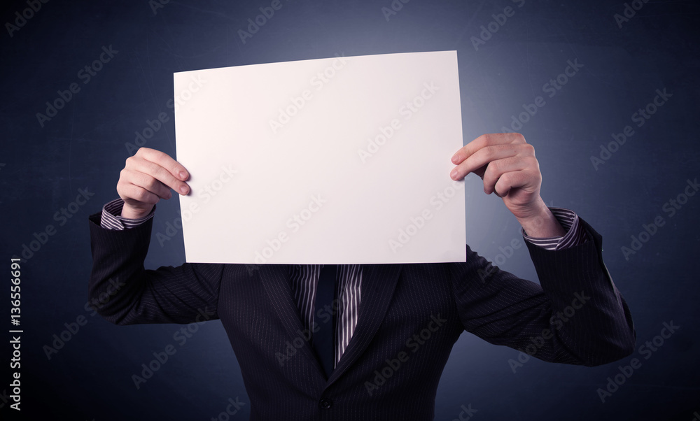 Businessman holding blank paper Businessman holding blank paper