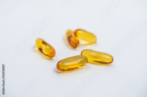 Vitamins, fish liver oil On a white background