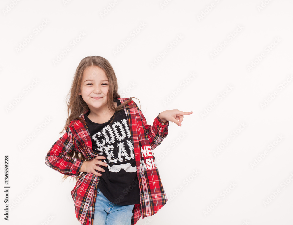 school girl pointing with finger away isolated on white. school girl pointing with finger away isolated on white.