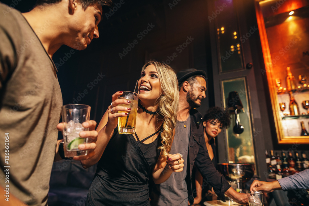 Group of people having fun at nightclub - obrazy, fototapety, plakaty 
