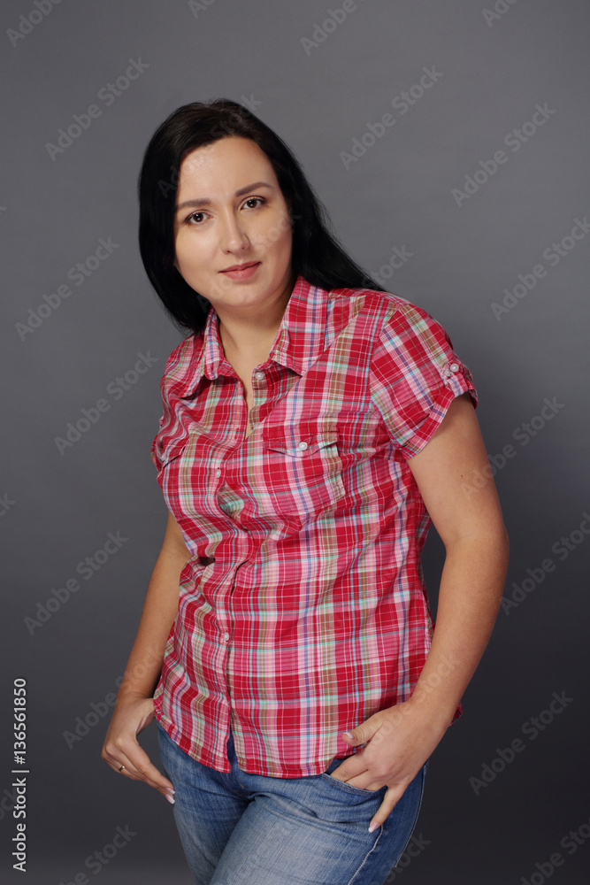 Beauty woman dressed in shirt with short sleeves Beauty woman dressed in shirt with short sleeves