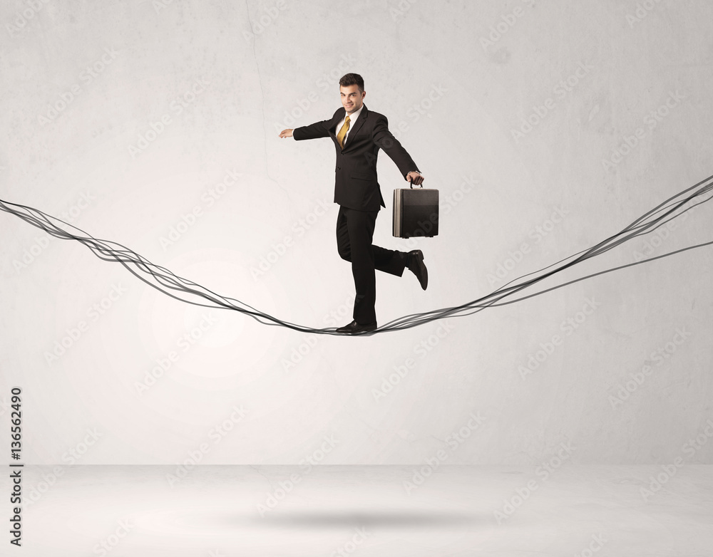 Sales person balancing on drawn ropes Sales person balancing on drawn ropes