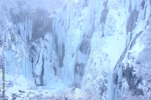Plitvice lakes, World famous National park in Croatia, UNESCO world heritage, frozen waterfalls, cold winter scene