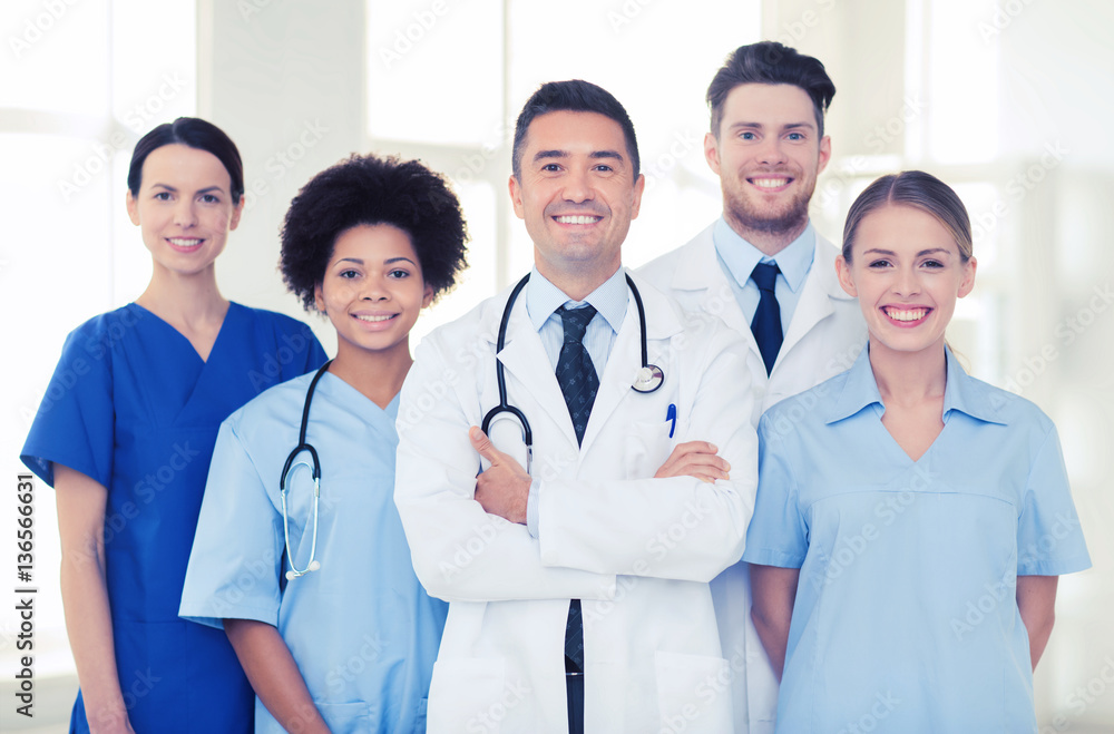 group of happy doctors at hospital group of happy doctors at hospital