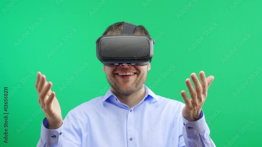 Man in a virtual reality mask observing digital video game world. 4K. Man in a virtual reality mask observing digital video game world. 4K.