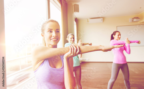 group of women working out in gym