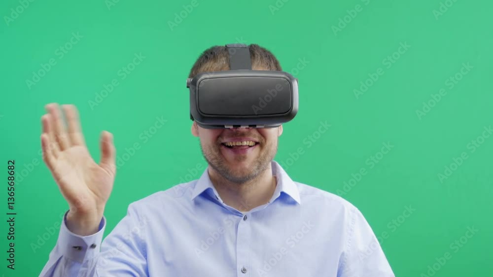 Man in a virtual reality mask observing digital video game world. 4K. Man in a virtual reality mask observing digital video game world. 4K.