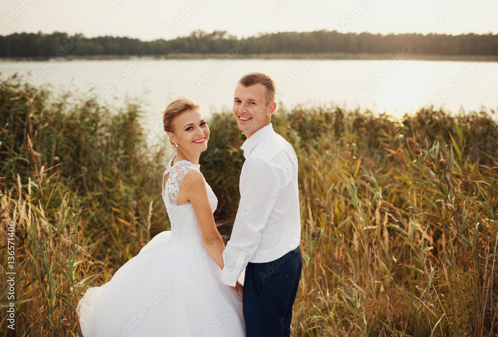 Lovely moment of the newlyweds on their wedding Lovely moment of the newlyweds on their wedding