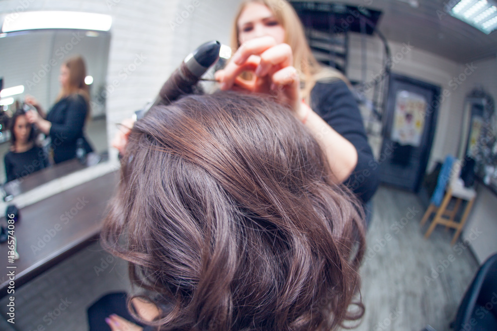 the hairdresser does a hair the hairdresser does a hair