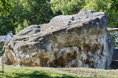 A big stone at women's orthodox monastery near rudi village at the north of republic of moldova photo