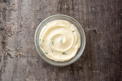 Aioli sauce isolated on wooden background.Top view 
