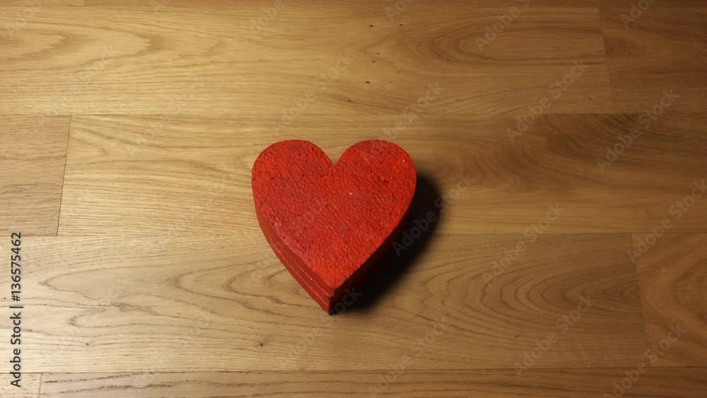 Female hands taking four red heart shapes from the stack. Love, care, Valentine's day, togetherness, family concepts. 4K video, top view Female hands taking four red heart shapes from the stack. Love, care, Valentine's day, togetherness, family concepts. 4K video, top view