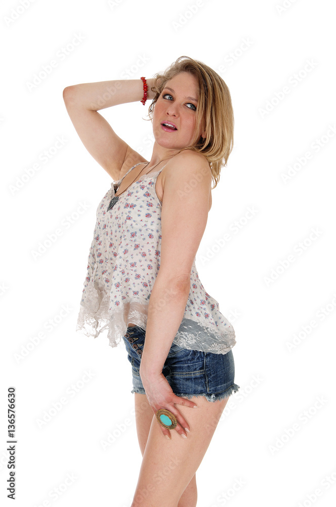 Young woman standing in profile. Young woman standing in profile.