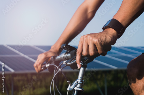 Close-up smart watch on arm man to ride a bicycle