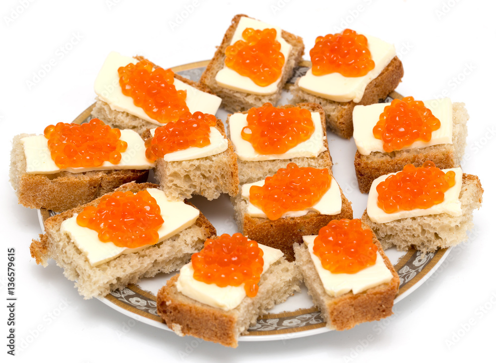 Red caviar sandwiches on white background