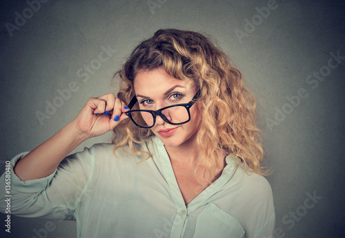 Obraz na plátně confused skeptical woman looking at you with disapproval