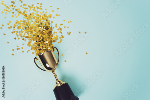 Canvas Print gold winner cup on blue  background