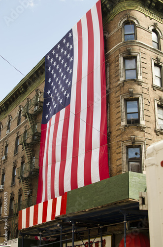 NEW YORK - USA September 12  2016 - Large US flag hanging from a little italy photo