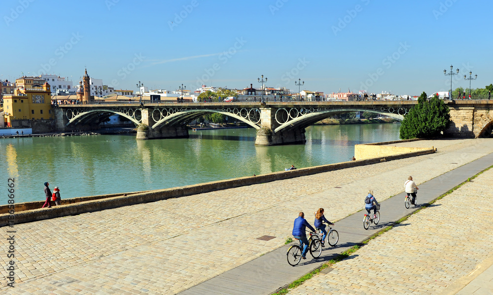 Fototapeta premium Family bike ride around Seville, Spain