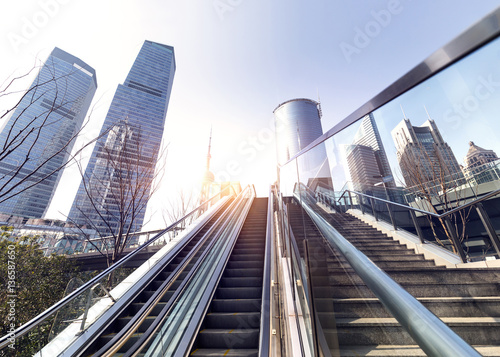 Escalator with sunlight in Modern City