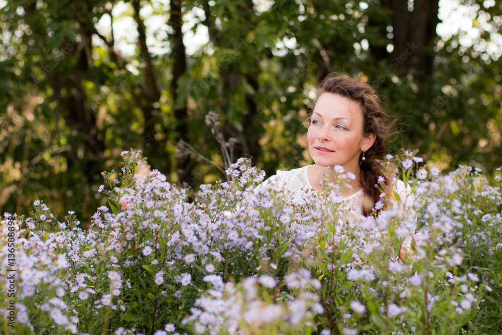 Nice girl and flowers in a nice day Nice girl and flowers in a nice day