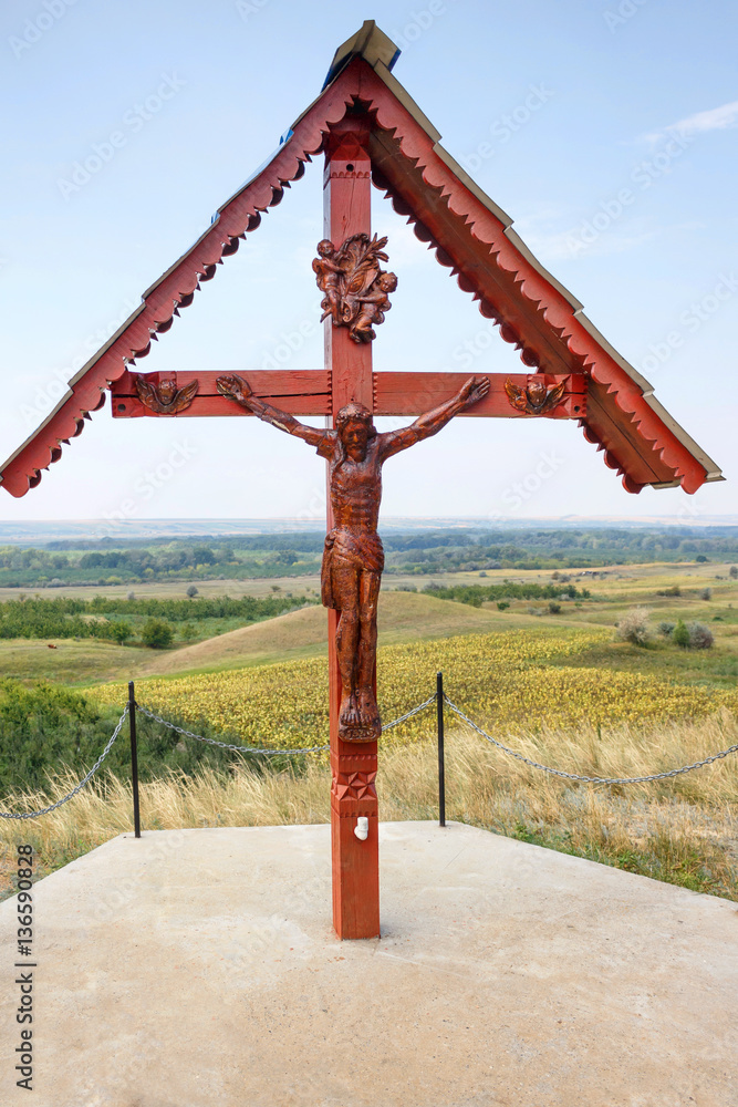 Wooden crucifixion in hundred risings and mounds area at the north of Moldova Wooden crucifixion in hundred risings and mounds area at the north of Moldova