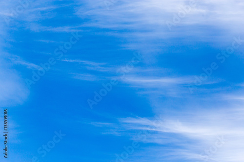 clouds in the blue sky as background