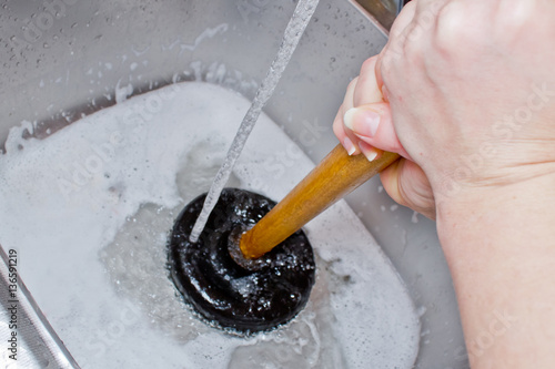  sink plunger in action