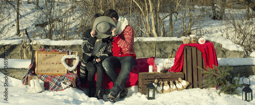 couple in love on the background of a winter landscape