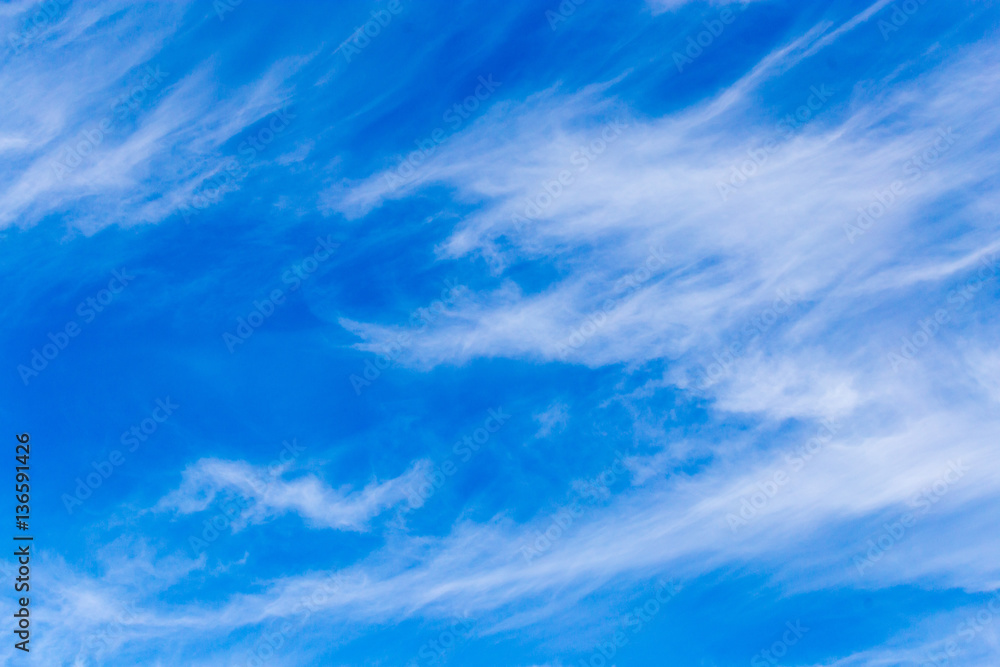 clouds in the blue sky as background