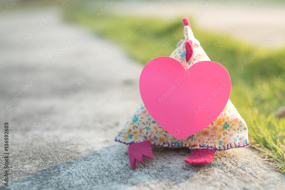 Fototapeta premium chicken cloth puppet with heart card