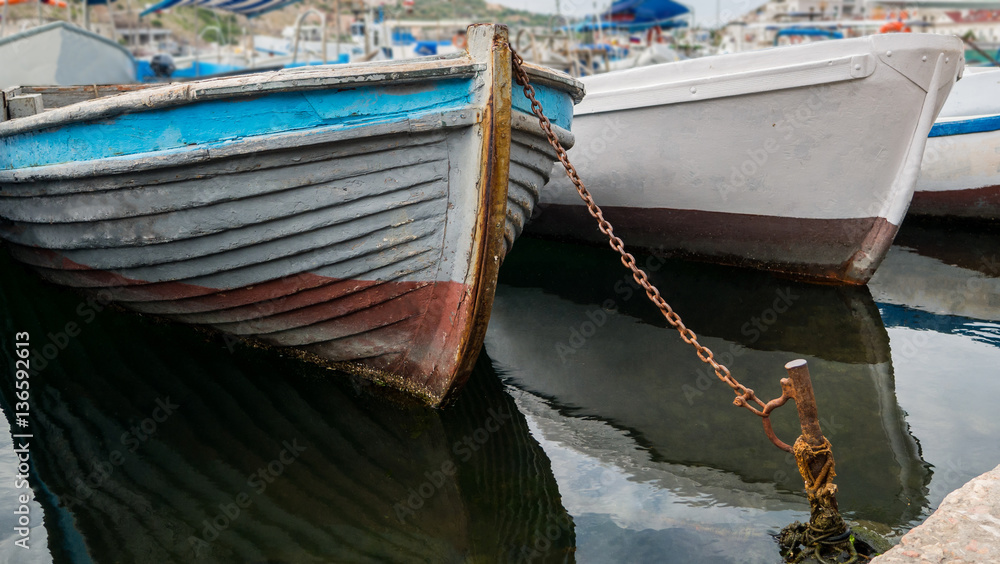 old wooden fishing boats at the pier