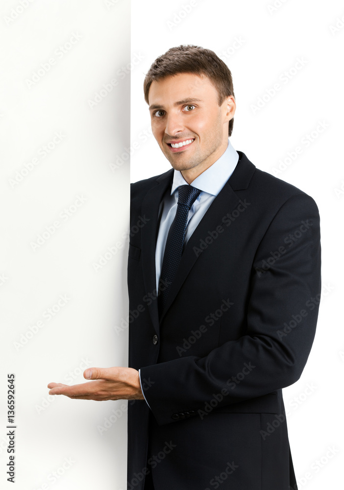 businessman showing signboard with copyspase businessman showing signboard with copyspase