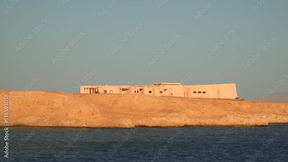 A building on seacoast. Deserted beach. A building on seacoast. Deserted beach.