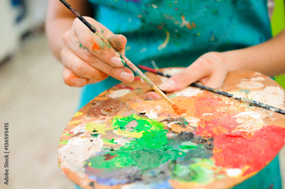 beautiful young girl draws a picture paints on art lesson beautiful young girl draws a picture paints on art lesson