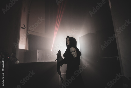 Dancer in a club dressed as ghost