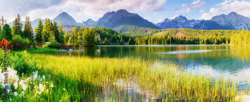 Majestic mountain lake in National Park High Tatra. Strbske ples photo
