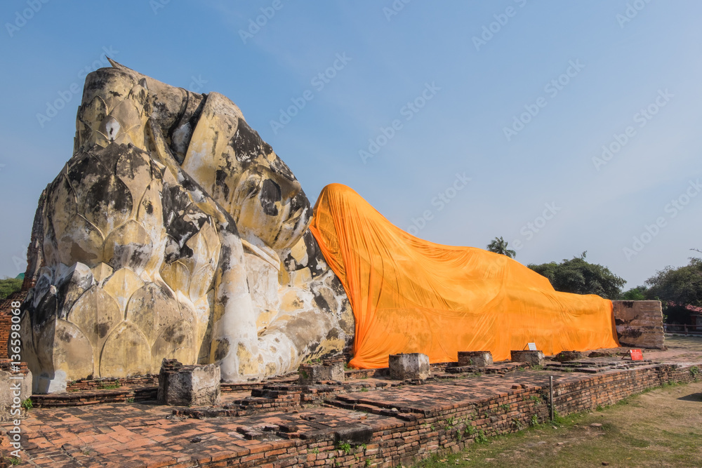 Giant Buddha reclining statue at Wat Lokayasutharam in the histo
