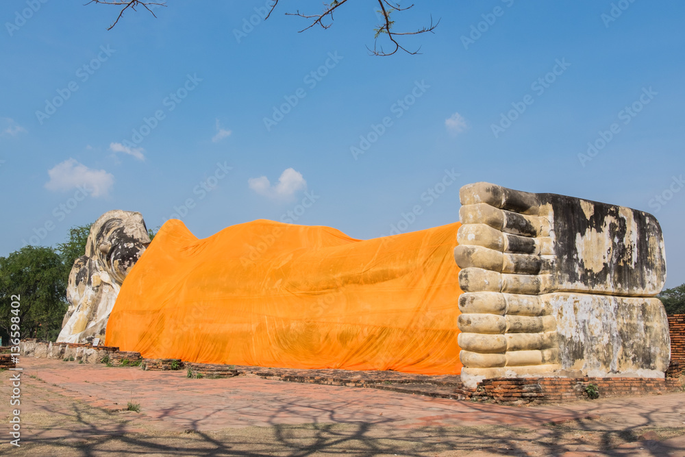 Giant Buddha reclining statue at Wat Lokayasutharam in the histo