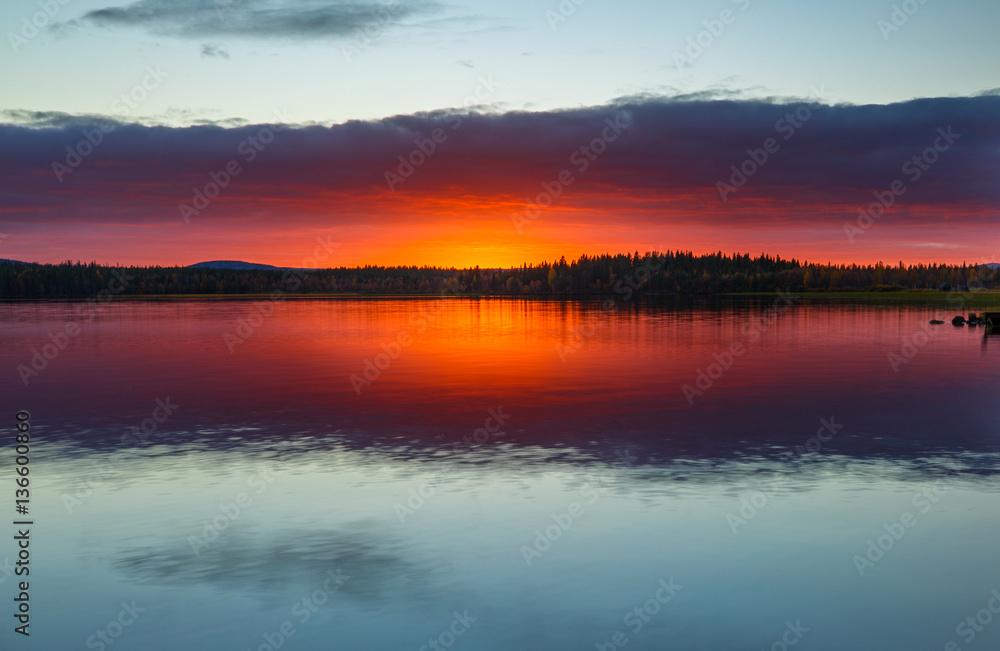Beautiful colorful sunset on the lake, Finland