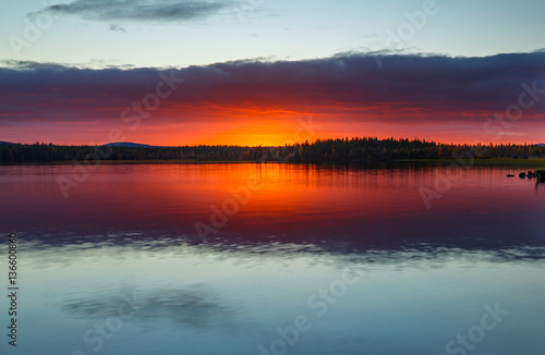Beautiful colorful sunset on the lake, Finland