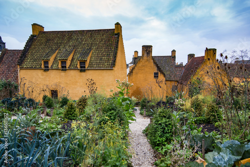 The jacobite garden behind Culross Palace in Culross, Scotland colorful village during autumn time. View from the garden. photo