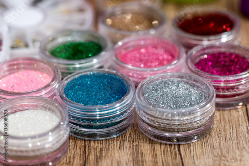 set of nail glitters of different colors, close up.