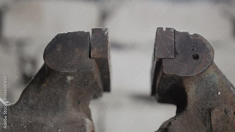 Bench vise tool is equipment for hold metal in industry. Bench vise slowly constricting Bench vise tool is equipment for hold metal in industry. Bench vise slowly constricting