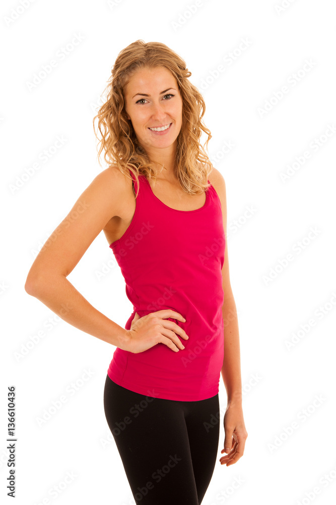 Cute young blond woman working out in fitness gym isolated over Cute young blond woman working out in fitness gym isolated over