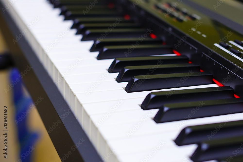 Piano keyboard background with selective focus. Warm color toned image Piano keyboard background with selective focus. Warm color toned image