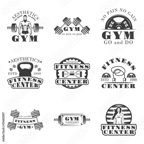 Fitness and bodybuilding set of vector vintage emblems, labels, badges and logos in monochrome style.