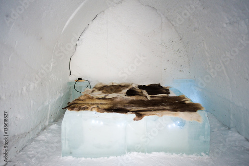 inside an igloo with an icebed